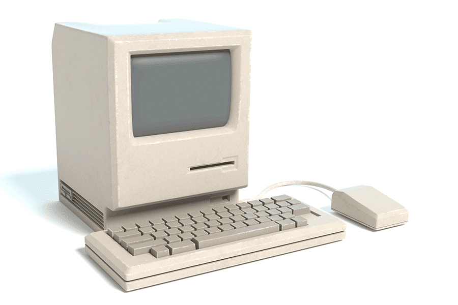 Old personal computer on white background
