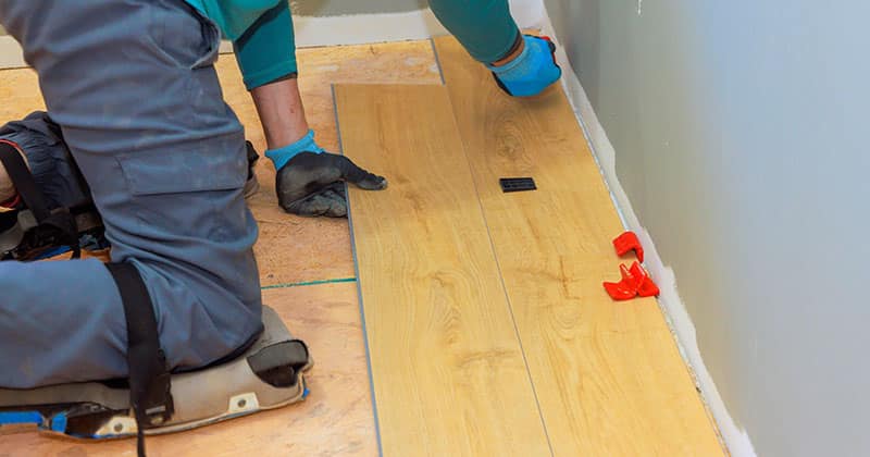 flooring contractor installs new floor.jpg